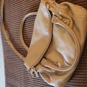 Kate Spade.....shoulder or carry bag.....tannish khaki....great striped lining